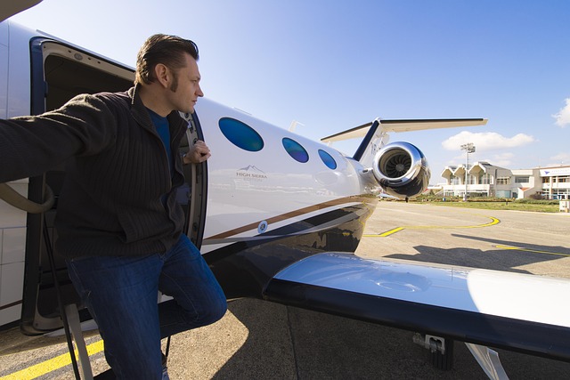 private jet wing view above clouds premium travel
