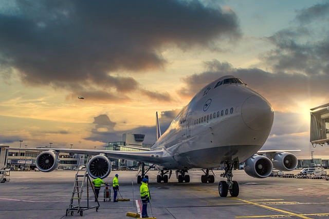 private jet on tarmac at dusk with gold light
